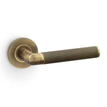 Harrier Knurled Lever on Round Rose Antique Brass Lacquered