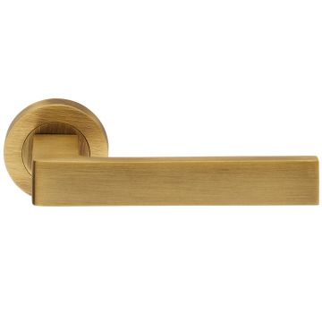 Criterion DL01 Lever Door Handle on Round Rose Antique Brass Lacquered
