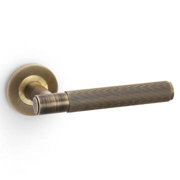 Colonial Lever Handle on Round Rose Brushed Antique Brass Lacquered
