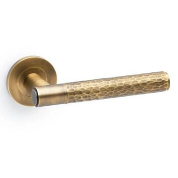 Rosa Lever Handle on Round Rose Antique Brass Unlacquered