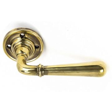 Newbury Lever Handle on Round Rose Aged Brass Unlacquered